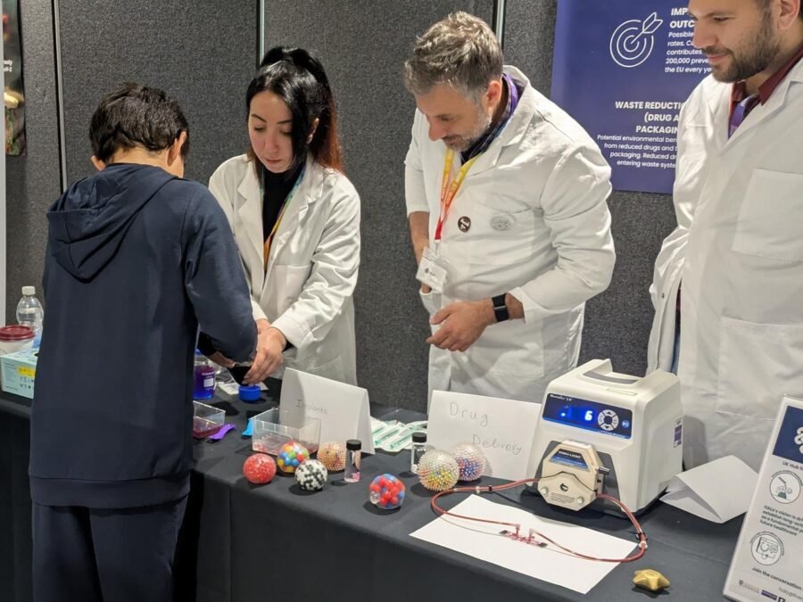 Explaining drug delivery to visitors at the HALo stand